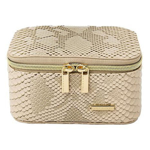 Travel jewelry box with gold snakeskin material and gold zipper and accents on a white background