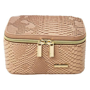 Travel jewelry box with blush snakeskin material and gold zipper and accents on a white background